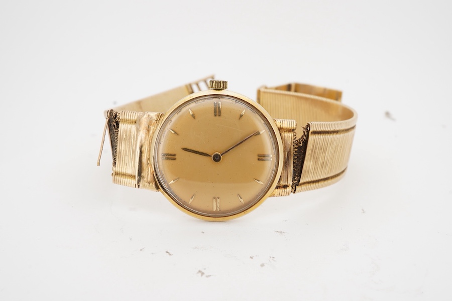 A gentleman's 1960's 14k Lucien Piccard manual wind wrist watch, with baton numerals and case back inscription, case diameter 27mm, on a damaged integral 14k bracelet.